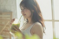 Healthy asian pregnant woman drink drinking contemplation.