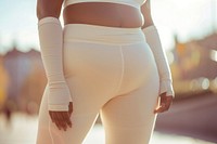 Woman wear sport spandex blank cream legging sports adult undergarment.