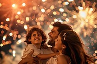 Family smileing and talking fireworks laughing portrait.