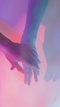 Two hand holding purple finger pink.