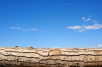 Wooden log border sky backgrounds outdoors.