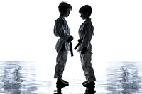 Boys judo fighters in sports hallin silhouette boy white background togetherness.