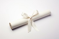 Diploma paper rolled ribbon white white background.