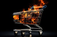 Shopping cart fire black background misfortune.