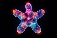 Starfish shaped saturn night illuminated underwater.