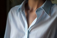 Extreme close up of shirt blouse midsection outerwear.