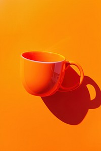Photo of cup mug refreshment tableware.