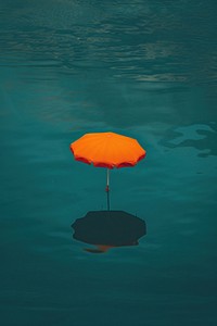 Photo of lifestyle umbrella outdoors floating.