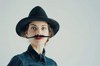 Woman with fake mustache and wear hat portrait photography moustache.