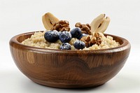 Wooden bowl of semolina porridge blueberry breakfast plant.