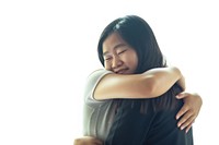 Two asian young women hugging adult contemplation affectionate.