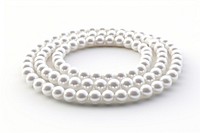White pearl beads string necklace jewelry pill.