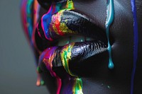 Color paint dripping on black lip skin creativity toothbrush.