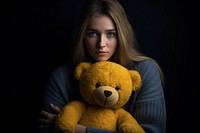 Person holding teddy bear portrait yellow adult.