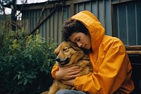 Person hugging a dog person affectionate relaxation.