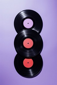 Photo of 3 vinyl purple electronics gramophone.