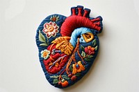 Photo of the heart in embroidery style pattern representation creativity.