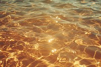 Water surface backgrounds sunlight outdoors.
