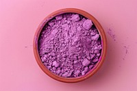 Holi color powders purple bowl cosmetics.