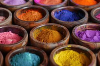 Holi color powders arrangement ingredient container.
