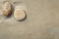 Zen rock on sand backgrounds outdoors pebble.