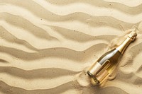 Champagne on sand backgrounds outdoors bottle.