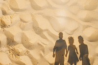 Family shadow on sand backgrounds outdoors walking.