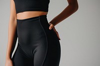 Woman waist wearing black bodysuit spandex pants adult.