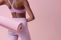 Woman back wearing yoga outfit adult pink undergarment.