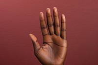 Black woman hand finger hand sign gesturing.