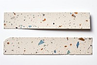 Terrazzo adhesive strip paper wall white background.