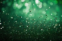 Beautiful green confetti falling background backgrounds glitter illuminated.