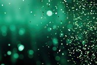 Beautiful green confetti falling background backgrounds glitter illuminated.