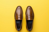 Brown leather loafer shoes footwear clothing fashion.