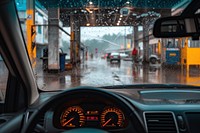 View from the inside the glass of the car during automatic car washing vehicle rain transportation.