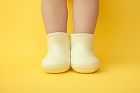 White booties footwear yellow baby.