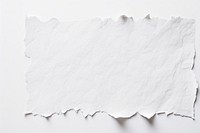 A paper with scribble on it white backgrounds torn.