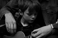 Teaching a guitar musician finger person.