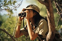 Woman using Binoculars binoculars adult photo.