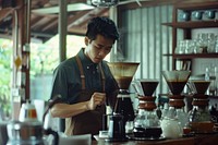 Thai barista drip coffee cup mug concentration.