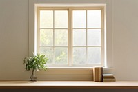 Double-hung windows windowsill plant architecture.