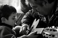 Teaching a guitar musician finger person.