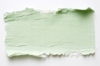Green paper backgrounds torn.
