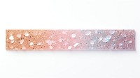 Glitter marble adhesive strip white background rectangle textured.