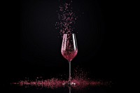 Wine sparkle light glitter drink glass black background.