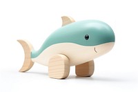 Toy whale wood white background.
