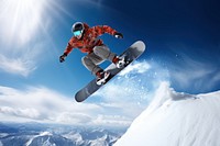 Snowboarder jumping against blue sky snow snowboarding recreation.