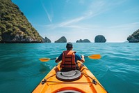 Traveler kayaking in the thai ocean from backward view recreation lifejacket vehicle.