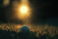 Golf ball sunlight outdoors nature.