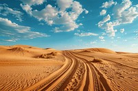 Desert with wheel tracks landscape outdoors horizon.